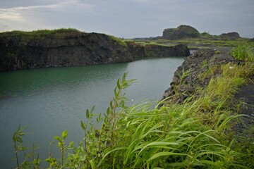 Lake surrounded by mountains and forests