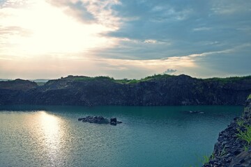 Beautiful lake surrounded by forest and mountains 