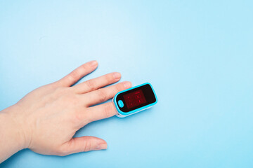 pulse oximeter on the finger to measure the level of hemoglobin in the blood