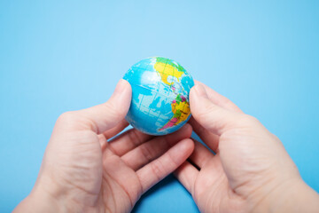 protection of the planet, environment, care for nature, globe in hands