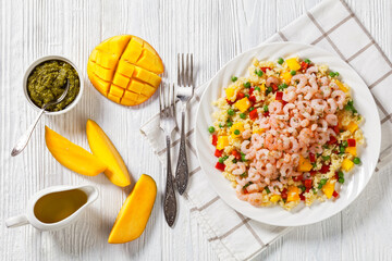 shrimps and millet pilaf with mango and veggies