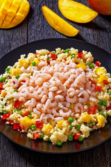 shrimps and millet pilaf with mango and veggies