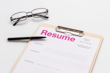 Resume application form on office table. Find new job concept