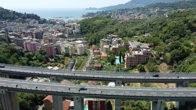 motorway viaduct suspended on high concrete pylons in Liguria near Genoa, site of the collapse bridge of the Morandi bridge, motorway tragedy in Italy -drone view of  highway, Rapallo 