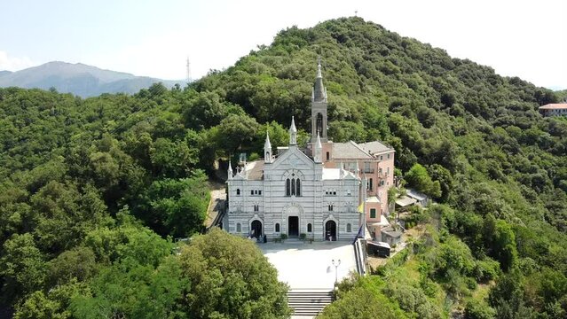 Italy, Rapallo, Liguria, Drone aerial view of the Catholic Church sanctuary of Montallegro stands on the top of the  mountain overlooking the sea of the bay of Portofino near Genova and Cinque Terre