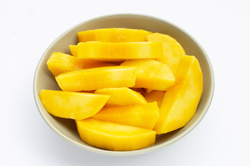 Yellow mango slices on white background.