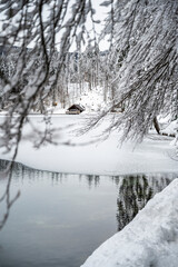 Snow winter in Fusine. Magic of the lower lake.