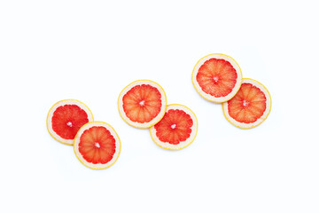 Grapefruit slices on white background.