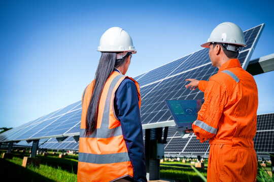 Engineers take investors on a tour of solar power plants. solar panels are an alternative electricity source to be sustainable resources in the future. The clean energy concept saves the world