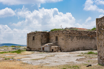 Ancient buildings in Cappadocia above the underground city. A masonry building in Turkey.