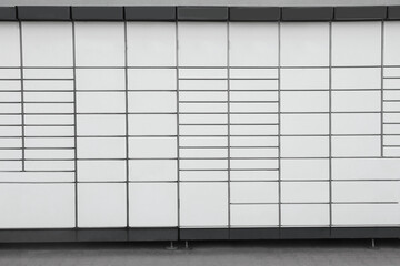 Modern parcel locker with many postal boxes