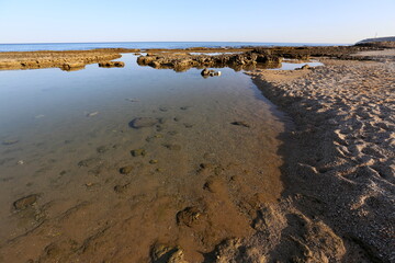 Fototapeta na wymiar Rocky shore of the Mediterranean Sea in northern Israel.