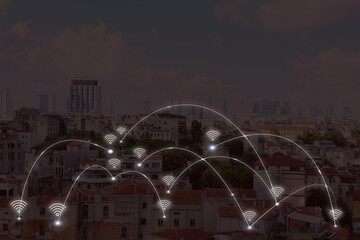 Picturesque view of city with building and wi-fi symbols