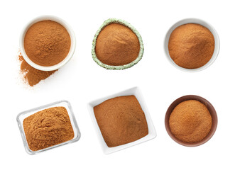 Set with aromatic cinnamon powder on white background, top view