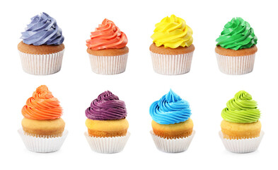 Set of colorful birthday cupcakes on white background