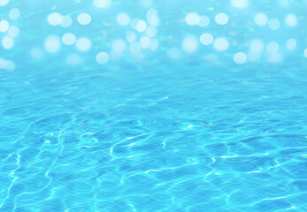 Swimming pool with clear turquoise water. Bokeh effect