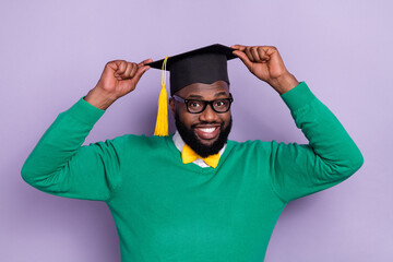 Portrait of young brilliant college student wear mortarboard on graduation ceremony isolated on...