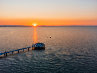 Sunrise in Lignano Sabbiadoro seen from above. From the sea to the lagoon, the city of holidays