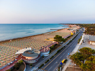 Sunrise in Lignano Sabbiadoro seen from above. From the sea to the lagoon, the city of holidays - 513916056