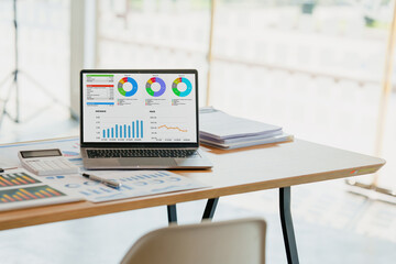 Business Finance audit tax Concept. Laptop and analytics program on screen.