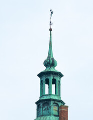 Fototapeta na wymiar Large Majestic Spires on the famous royal Frederiksborg Castle in Denmark.