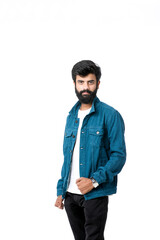 Young indian man wear jacket and giving expression over white background.