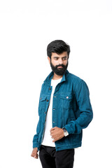 Young indian man wear jacket and giving expression over white background.