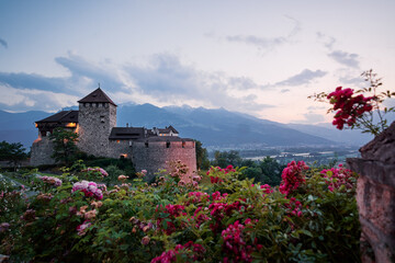Vaduz Royal castle in Liechtenstein. Scenic landscape of old medieval castle in Alps mountains in summer. Beautiful view of Alpine nature.