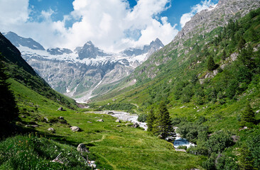 Travel by Switzerland. Beautifl summer landscape. River in Alps Mountains. © Loginova