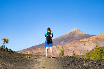 man hiking towards the volcano in El Teide national park  Tenerife