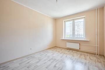 Photo of an empty room before the sale