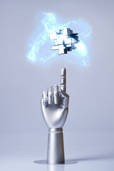 Mechanical robot arm or hand interacts with futuristic digital technologies.