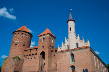 Fototapeta na wymiar The castle in Reszel was built of red brick.
