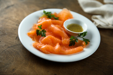 Homemade gravlax salmon with mustard sauce