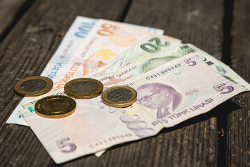 Lira money of the Republic of Turkey on a wooden table