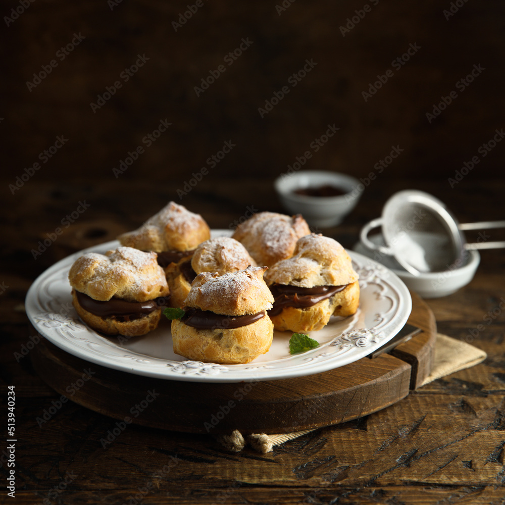 Canvas Prints homemade profiteroles with chocolate paste