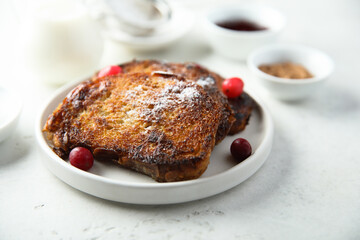 Homemade French toast on a white plate