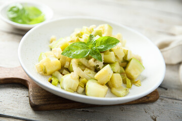 Homemade courgette ragout with fresh basil