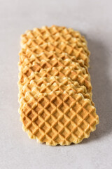 Tasty Butter Waffle Cookies on Gray Background Vertical