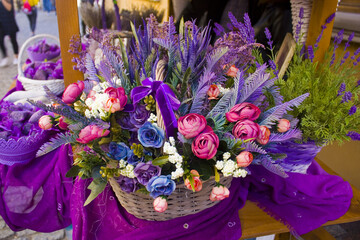 Decorative basket with artificial flowers