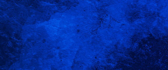 Fototapeta na wymiar Blue textured paper or concrete wall background. Dark edges. copy space, dark blue rough grainy stone or concrete wall texture background.