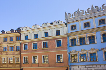 Fototapeta na wymiar Facades of old buildings on the Market Square in Lublin, Poland 
