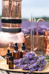 Distillation of lavender essential oil and hydrolate. Copper alambic for the flowering field.