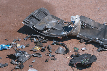 Fragment of a Russian missile after hitting a building. Shards of metal. Russian invasion of...