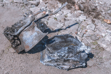 Fototapeta premium Fragment of a Russian missile after hitting a building. Shards of metal. Russian invasion of Ukraine in the city of Dnipro.