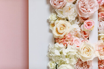 Flowers wall background with amazing pink and white roses, peonies and hydrangeas, wedding decorations, handmade.