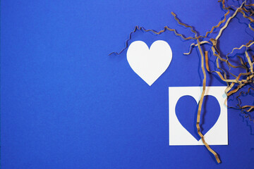 love is a white heart on a blue background