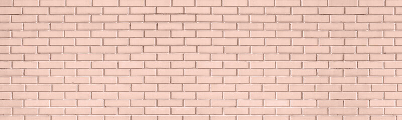 Warm beige old brick wall wide texture. Pastel peach orange color shabby brickwork. Abstract...