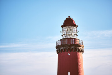 Top of red lighthouse Bovbjerg Fyr . High quality photo