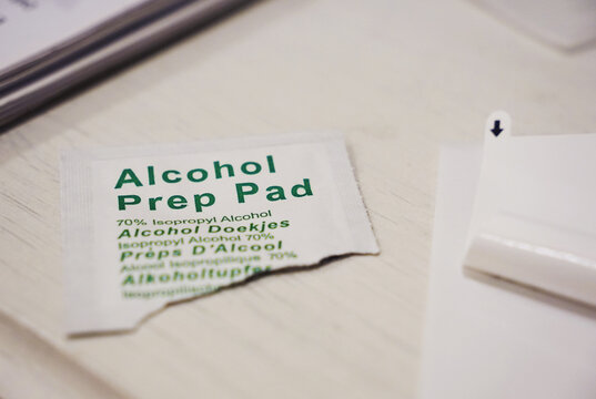 Opened Alcohol Prep Pad Package Used To Clean Glass Surface                              